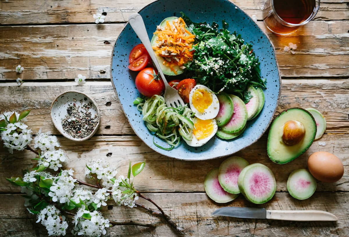 Fresh healthy food and measuring tape
